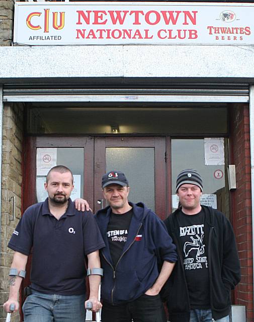 Carl Rigg (left) with his neighbours at the Newtown National Club.