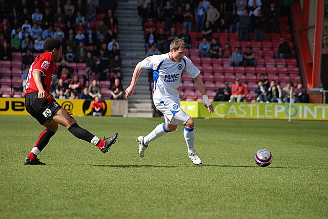 Ciaran Toner bursts away from Danny Hollands.