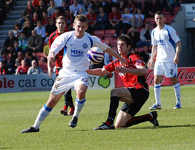 Jones gets away from Ryan Garry.