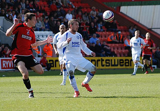 Adam Le Fondre gathers possession under pressure from Pearce.