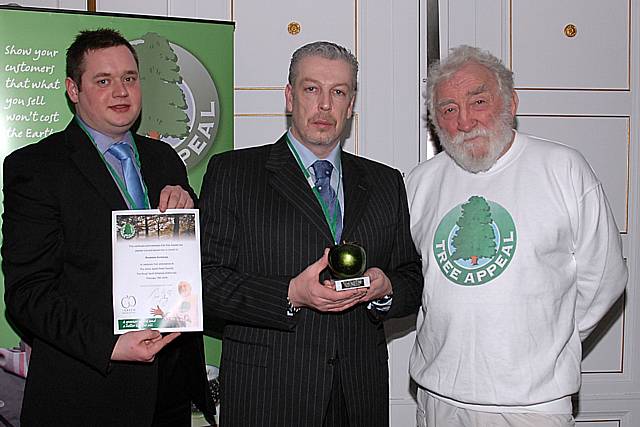 Members of the Rochdale Exchange team are presented with their Golden Green Apple award for waste management.