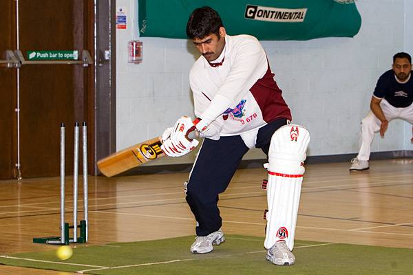 Action from the BASAF Indoor Cricket competition.