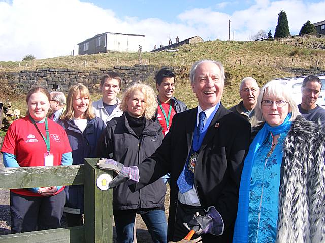 Mayor Robin Parker marks the official opening of the new heritage trail by placing the first way marker.