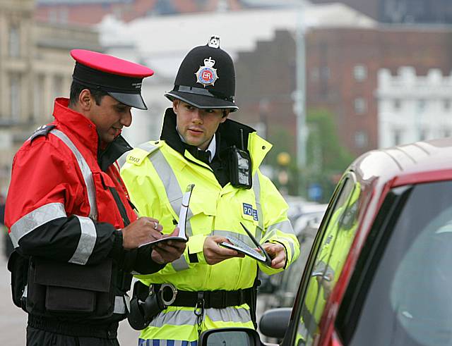 On patrol: NSL Civil Enforcement Officer Sarmad Khan and Rochdale PC Shane Cook