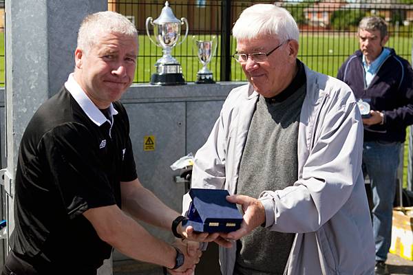 RDSFL President Eddie Melvin presents the referee with his match award