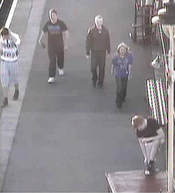 CCTV still of youths trespassing at Heywood Railway Station