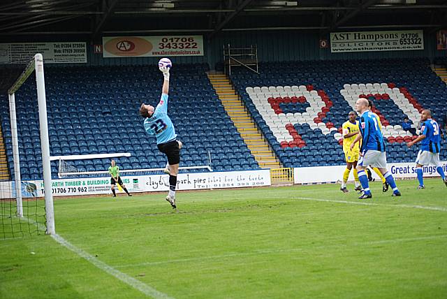 Alan Julian turns Ramsden's attempted lob over the crossbar.