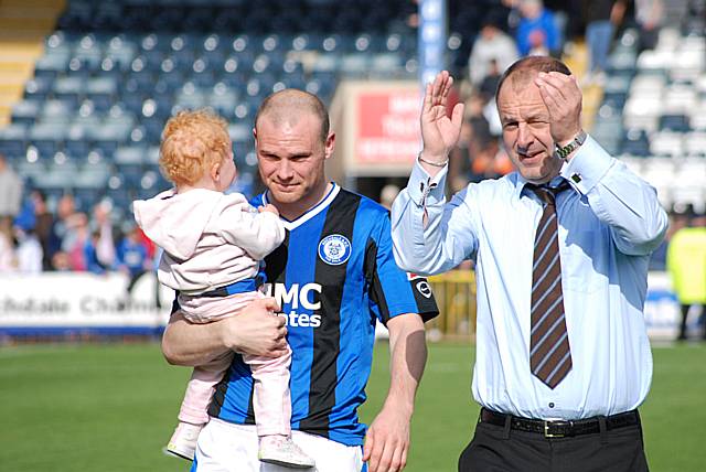 Club captain Gary Jones and Keith Hill applaud the supporters.