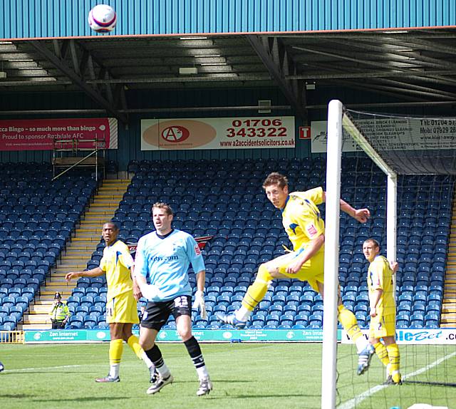 Southall nods Jon Shaw's looping header off the line.