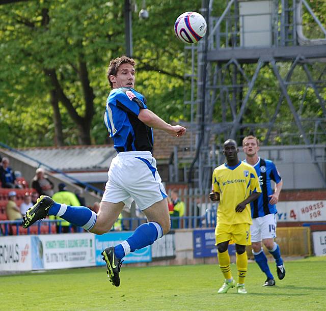 Shaw wins a header.