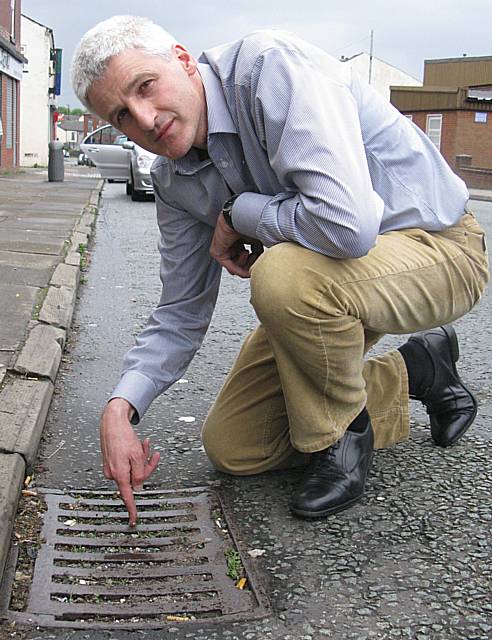 Councillor William Hobhouse at one of the blocked gullies in Sudden.