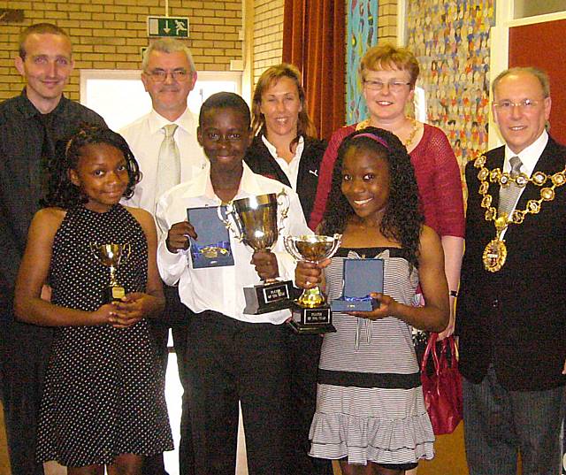 Score: Anthalie Mukambilwa, Axel Tuanzebe and Patricia Diba with their awards