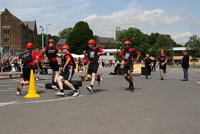 Students demonstrate their skills on the assault course.