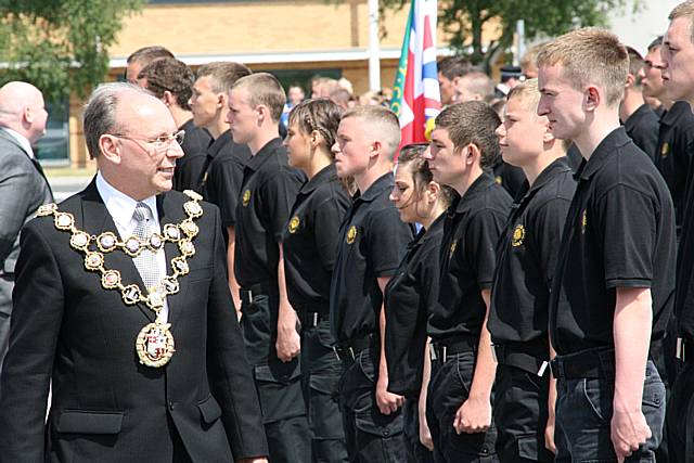 The Mayor of Rochdale, Councillor Keith Swift, inspects the parade. 