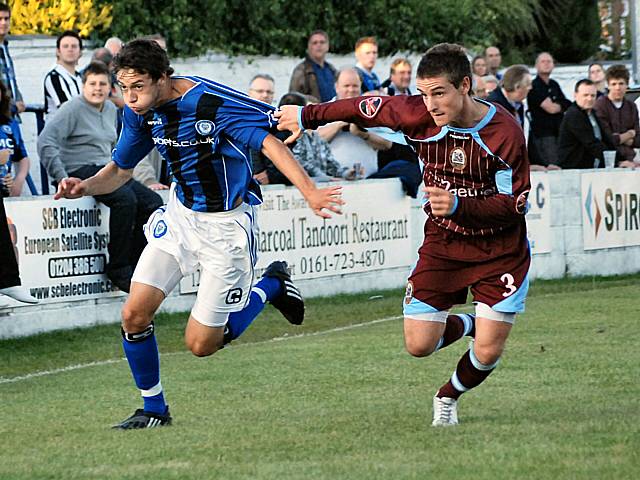 Will Buckley chases the ball down.