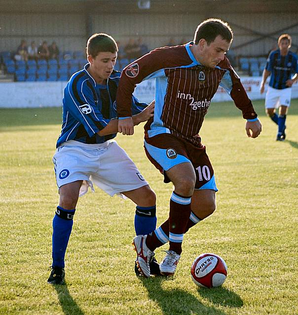 Josh Brizell pressures a Radcliffe attacker.