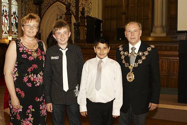 Jack Lofthouse and Hassan Akhtar with the Mayor, Councillor Keith Swift, and Mayoress Sue Etchells.