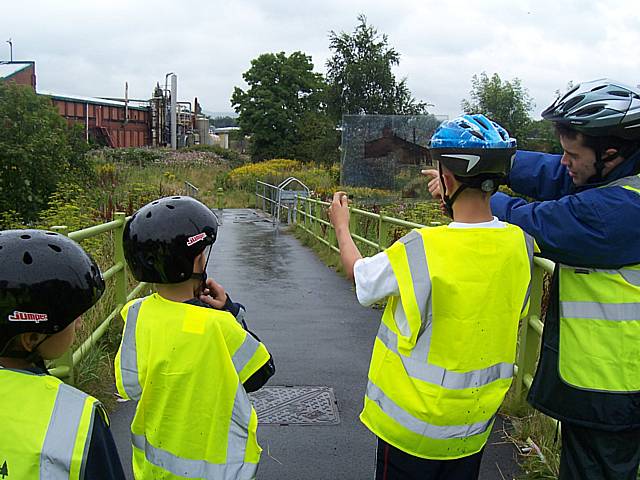 A graduate volunteer with young people in Belfield.