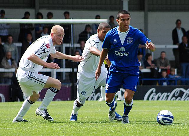 Tim Cahill points Everton forward.