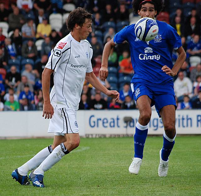 Will Buckley looks to bring the ball down.