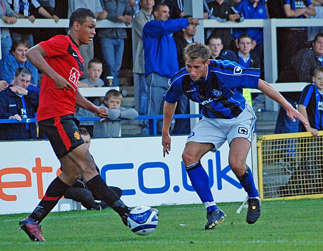 Craig Dawson in action for Dale during a pre-season fixture against Manchester United's youngsters.