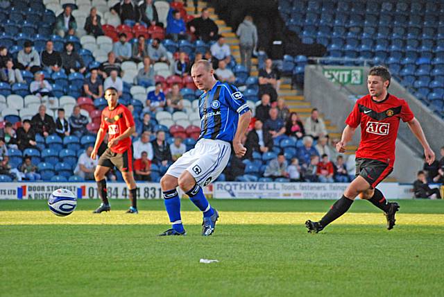 Gary Jones receives a pass.