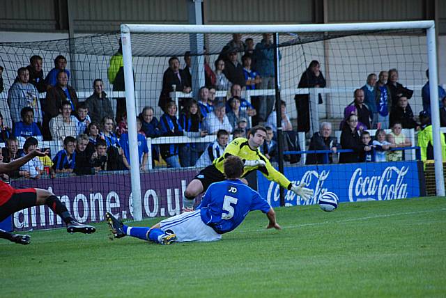 Arthur saves from King at full stretch.