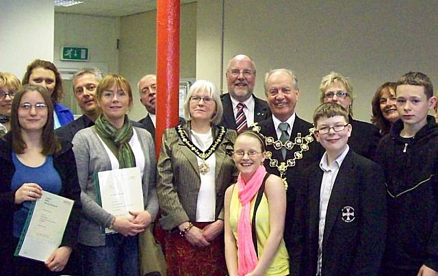 Young people with their certificates alongside mentors, staff, trustees and last year's mayor Councillor Robin Parker.