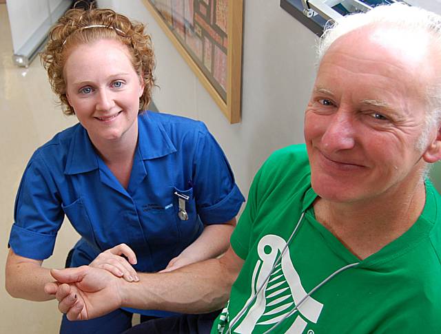 A patient gets his pulse checked