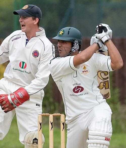 Milnrow professional Kamran Younis strikes out.