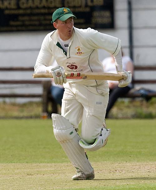 Star of the Milnrow batting line up, Max Power goes for a run in to try and keep the score ticking over.