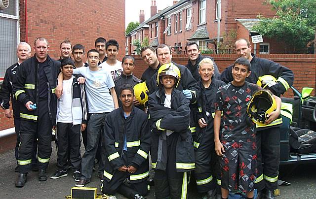 Fire fighters cut the young people out of a car in what could be a real-life situation