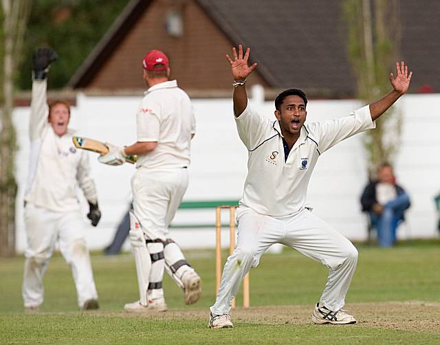 Kash Weeraratne celebrates the vital wicket of Simon Wright during Rochdale’s Wood Cup semi-final victory over Crompton. The Sri Lankan professional has this week agreed terms with the Redbrook club for next season.