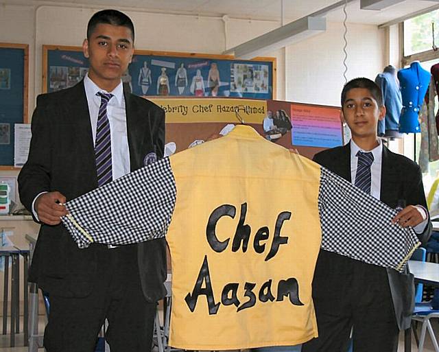 Year 10 pupils Viqas Bhatti (left) and Nazam Suleman at Falinge Park High School with their chef outfit