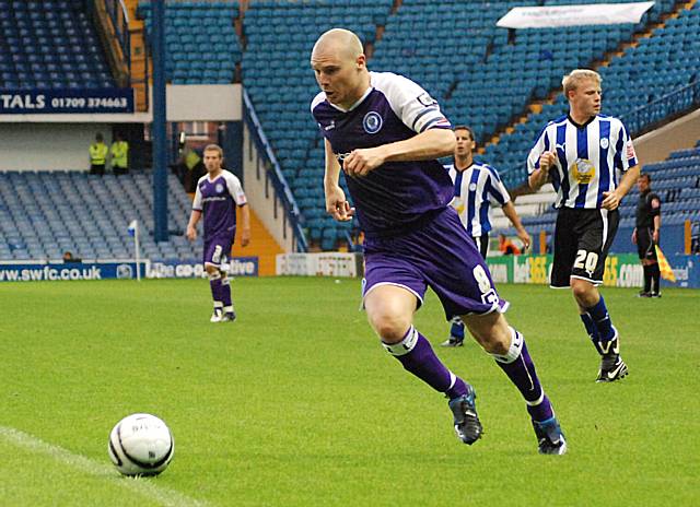 Gary Jones gets round the back of the Wednesday defence.