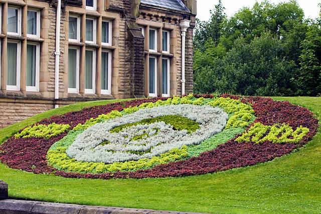 Flower bed in tribute to Springhill Hospice at the side of Touchstones