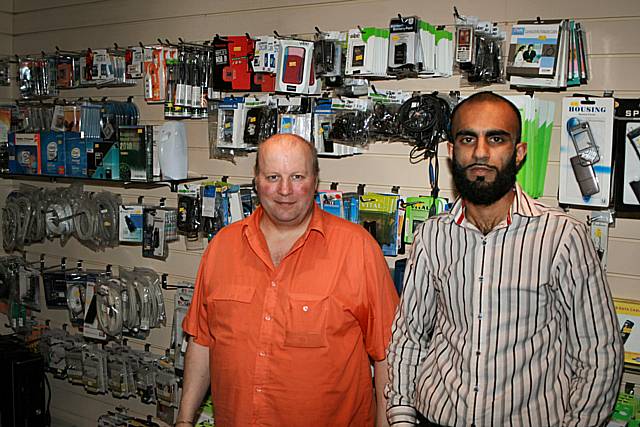 Stephen McLean and Mohammed Hanif at PC Comms in Castleton Post Office.