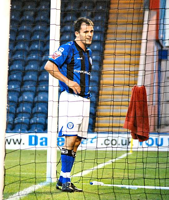 Chris Dagnall stands hands on hips in the Cheltenham goalmouth after failing to give Dale the lead with a volley from eight yards out.