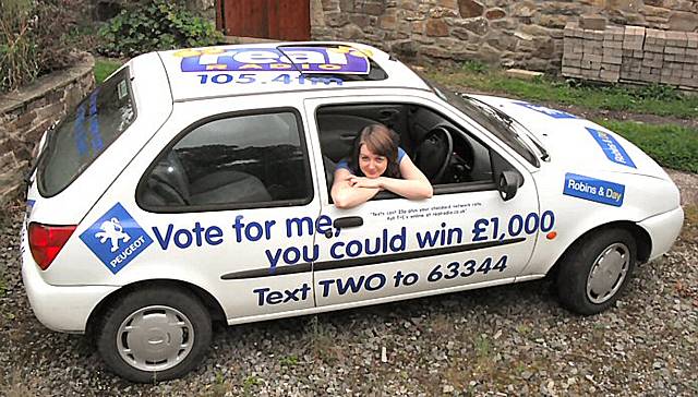 Sarah Cryer in her banged up Fiesta.