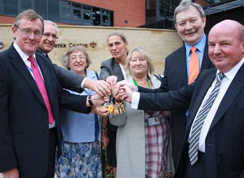 John Pierce, Chairman, and Trevor Purt, Chief Executive of NHS HMR, Sheila Hill, Steering Group Chairman, Vicki Devonport, NDC Chief Executive, Councillor Linda Robinson, Council Leader Alan Taylor and Peter Forrest, Eric Wright Group Director, with the keys to the new Phoenix Centre.
