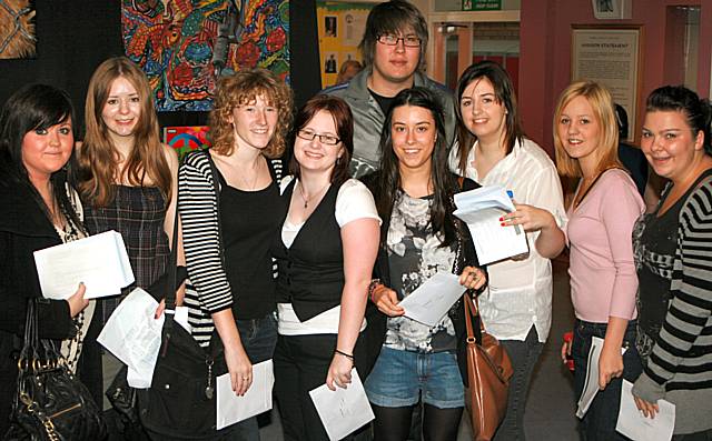 Students from Cardinal Langley celebrate their results.