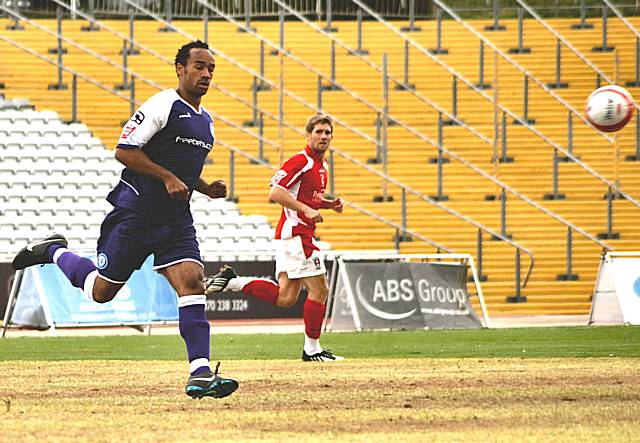 Dale debutant Chris O'Grady tracks the ball down.