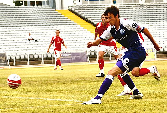 Will Buckley fires in a near post shot.