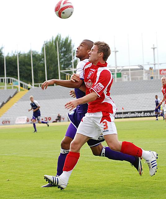 Joe Thompson locks horns with Jamie Green.