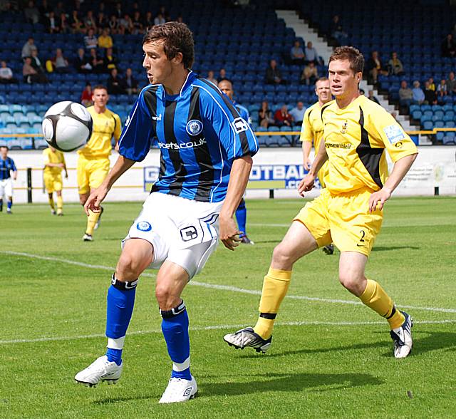 Will Buckley maintains possession.