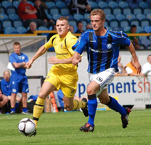 Scott Wiseman bursts forward.