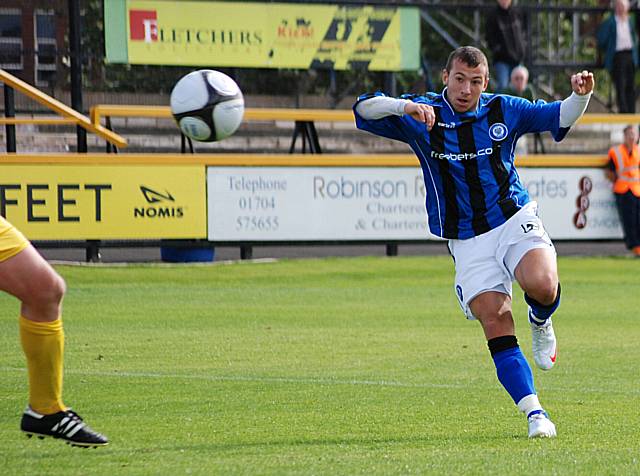 Adam Le Fondre scores Dale's fourth goal against Southport last Saturday.