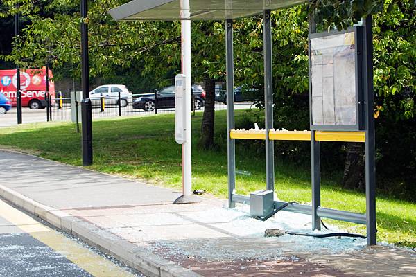 The GMPTE bus stop outside Tesco supermarket on Manchester Road, Sudden has been smashed to pieces by vandals