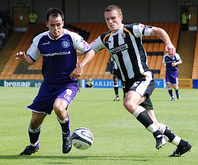 Dagnall gets the better of Lee Collins.