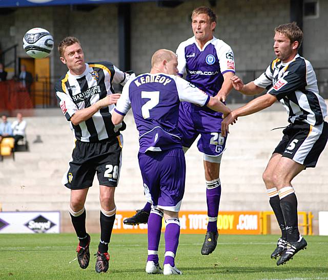 Craig Dawson goes up for a Dale corner.